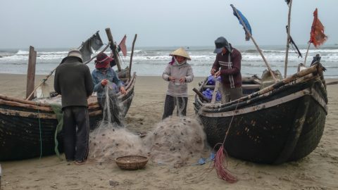 Vietnamese Fishermen by the coast